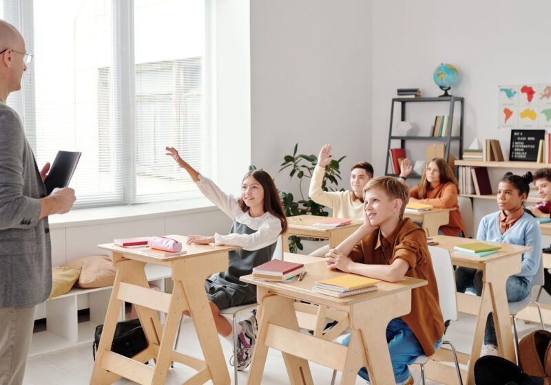 Teacher with a class of students